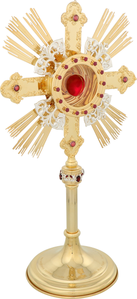 Relikwiarz mosiężny złocony w formie krzyża o wysokości 50 cm