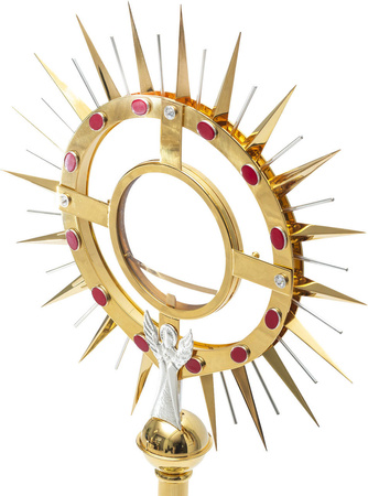 Duża monstrancja zdobiona kamieniami ,mosiężnymi, złoconymi i srebrzonymi  elementami o wysokości 80 cm