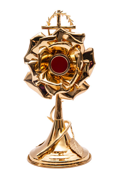 Relikwiarz mosiężny z motywem róży na jedną relikwię o wysokości 29 cm