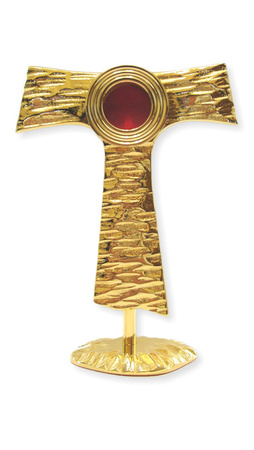 Relikwiarz mosiężny w kształcie franciszakńskiego symbolu o wysokości 20 cm